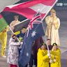 Cooper Woods and Danielle Scott are the flag-bearers for Australia at the closing ceremony of the Milano Cortina Games.
