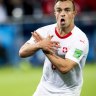 Switzerland strike late to sink Serbia