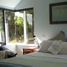 Tucked away in the hills ... the bedroom at Johanna Alpacas has a seaside feel.