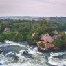 The lodge is surrounded by roaring white water.