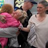 Several Australians on a Gaza-bound aid flotilla arrived in Sydney and have alleged abuse by Israeli authorities.