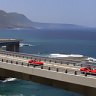 A-list ... Ferraris hug the Sea Cliff Bridge.