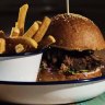 SYDNEY, AUSTRALIA - APRIL 09:  Pulled pork burger with fries at The Public in Cammeray on April 9, 2015 in Sydney, Australia.  (Photo by Christopher Pearce/Fairfax Media)