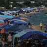 On a warm summer's day Safety Beach in Melbourne quickly fills with private tents.