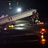 A firetruck responding to a different emergency drives in front of a landing Air Canada jet causes a collision resulting in the death of the pilot and co-pilot.