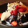 MELBOURNE, AUSTRALIA - MAY 21:  The black sticky rice, strawberries, banana, coconut cream and dried mango granola served at  Magic Mountain Saloon in the cbd on May 21, 2015 in Melbourne, Australia.  (Photo by Pat Scala/Fairfax Media)