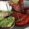 The Tuckshop breakfast combines eggs with pancetta, tomatoes, avocado and smashed peas.