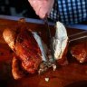 La Luna's Adrian Richardson shows how to carve a chicken.