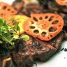 Porterhouse steak with coconut butter and lotus root.