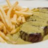 Signature dish: Steak, green salad with dijon vinaigrette and bottomless fries.