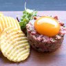 Steak tartare with egg yolk and gaufrette potatoes at 505 Wine Room, Toorak.