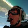 Sky high ... riding in the open-air cockpit of the Lilly Warra with pilot Chris Clark.