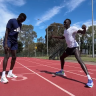 Sprinter Gout Gout trains with middle-distance runner Peter Bol in Melbourne.