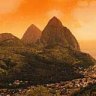 The bright side ... sunset over St Lucia's Pitons.