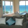 Beachfront bliss ... the Beach House's open-plan living areas with ocean views.