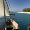 Spice Island scene ... a traditional dhow on its way to Mnemba.