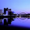 Newcastle by night: The redeveloped Tyne River waterfront and Gateshead Millennium Bridge.