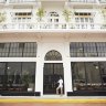 The entrance to the American Trade Hotel.