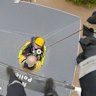 A NSW Police Polair helicopter rescues trapped Taree residents from the roofs of their homes.