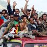 A loaded bus approaches Baucau.