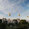 Maroons sponsor XXXX has flown inflatable beer cans over Brisbane ahead of the first game of the 2025 State of Origin series.
