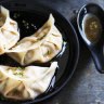 Pork and chive dumplings with red vinegar sauce.