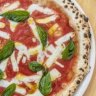 The classic margherita pizza, with an authentic charred crust.