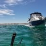 Two Perth divers were rescued by another boat after they became stranded off the coast of Perth.