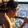 Woman overlooking Jodhpur from Meherangarh Fort.  India