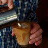 Sweet science: David Makin pours a latte.